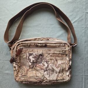 Fossils voyage crossbody bag